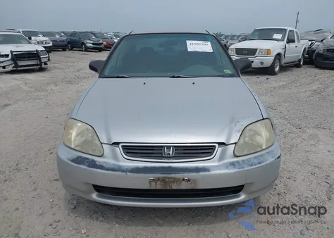 1999 Honda Civic Lx from USA, damaged, VIN 1HGEJ6677XL015230
